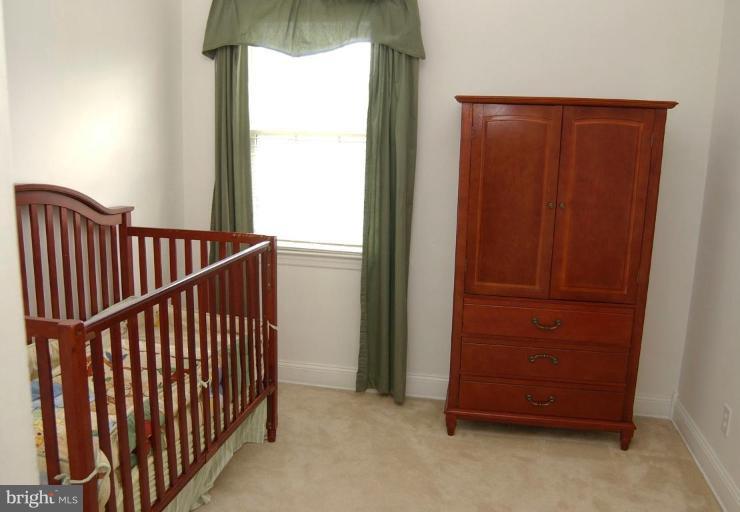 403 Greenlow Road Catonsville, MD 21228 - Photo 14 of 26 a view of a porch with wooden floor