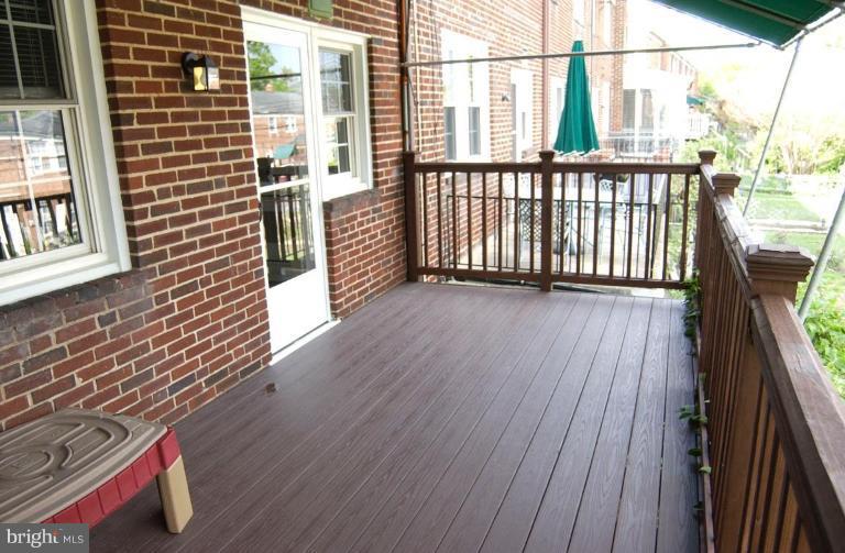 403 Greenlow Road Catonsville, MD 21228 - Photo 23 of 26 a view of a balcony with wooden floor