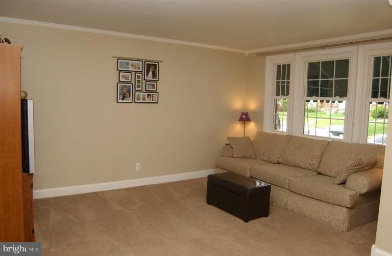 403 Greenlow Road Catonsville, MD 21228 - Photo 4 of 26 a living room with furniture and window