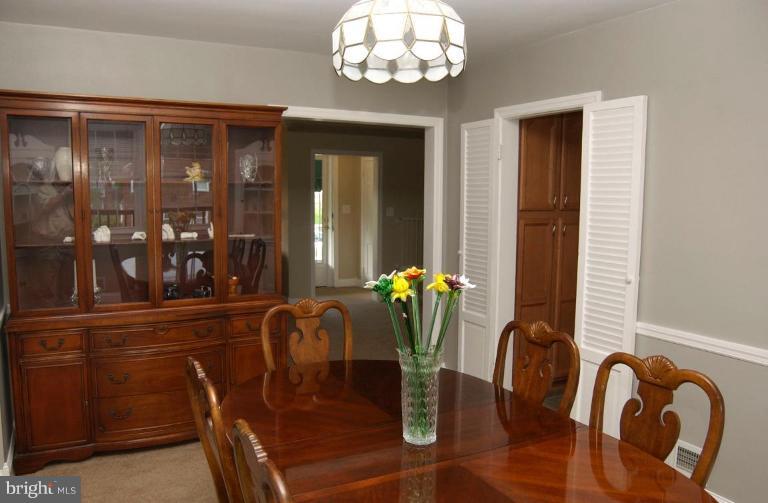 403 Greenlow Road Catonsville, MD 21228 - Photo 8 of 26 a dining room with furniture and window