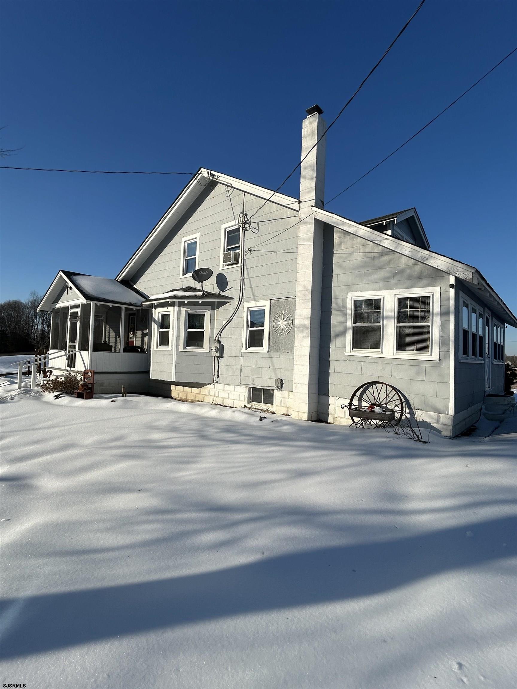 390 Jones Island Road Cedarville, NJ 08311 - Photo 2 of 41 a view of a house with street
