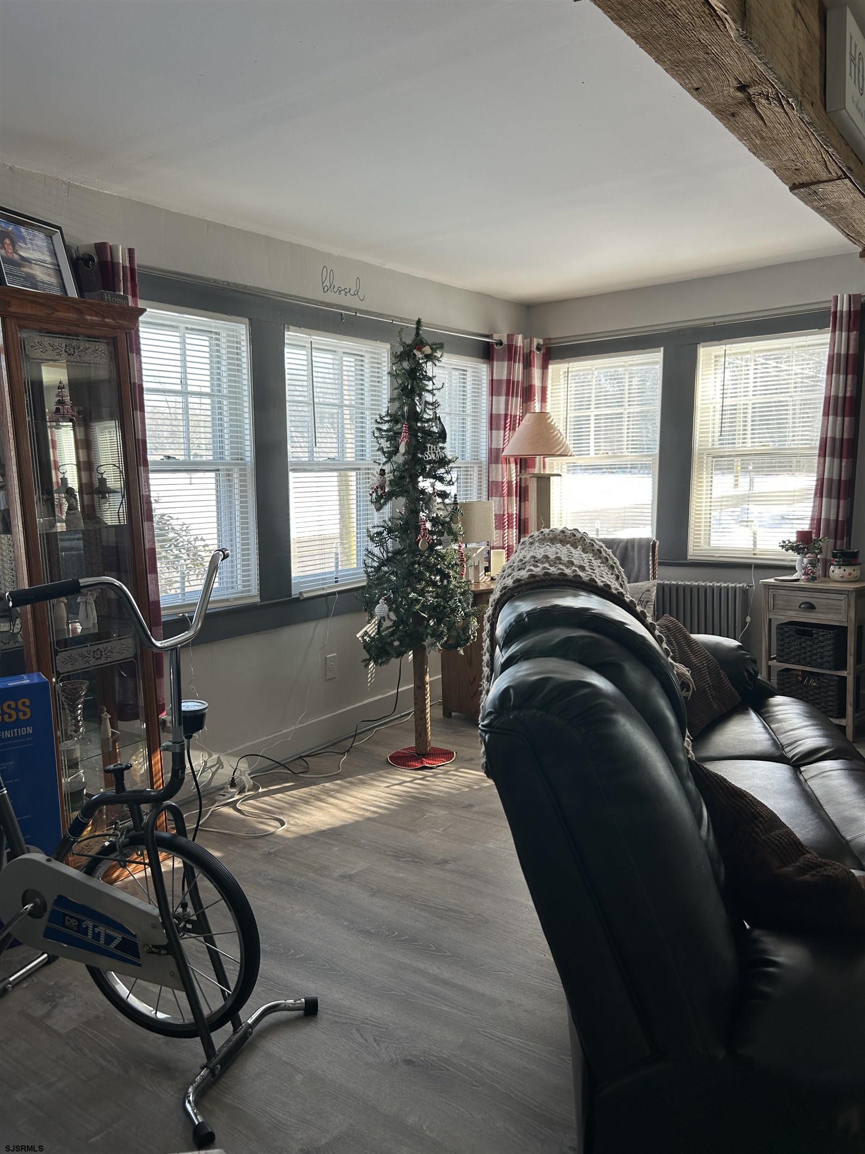 390 Jones Island Road Cedarville, NJ 08311 - Photo 21 of 41 a view of a livingroom with furniture window and hardwood floor