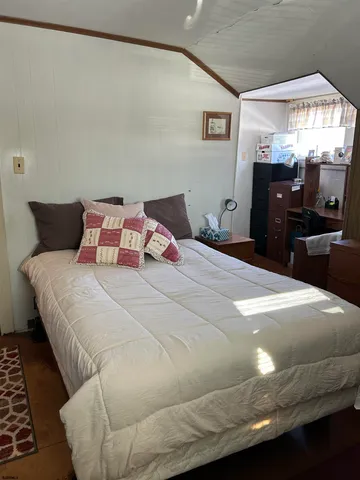 a bedroom with a bed