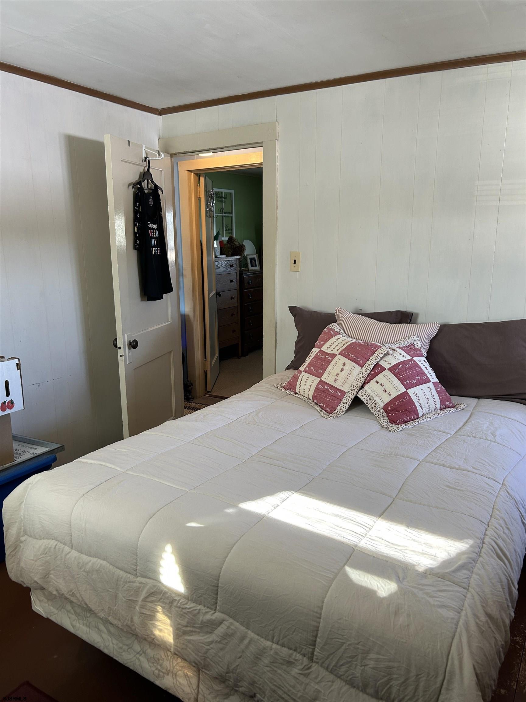 390 Jones Island Road Cedarville, NJ 08311 - Photo 28 of 41 a bedroom with a bed and a television