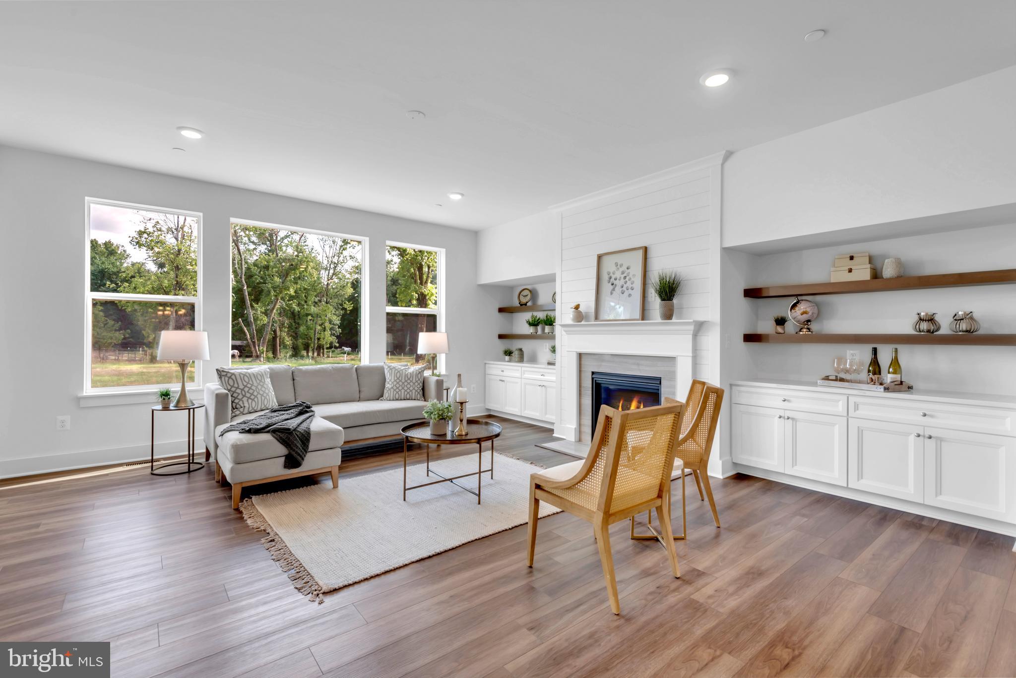 1331 German Driveway Hanover, MD 21076 - Photo 11 of 87 a living room with furniture and a fireplace