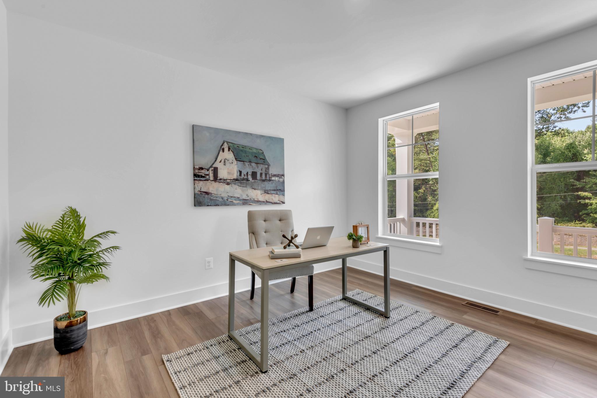 1331 German Driveway Hanover, MD 21076 - Photo 29 of 87 a work room with furniture and a potted plant