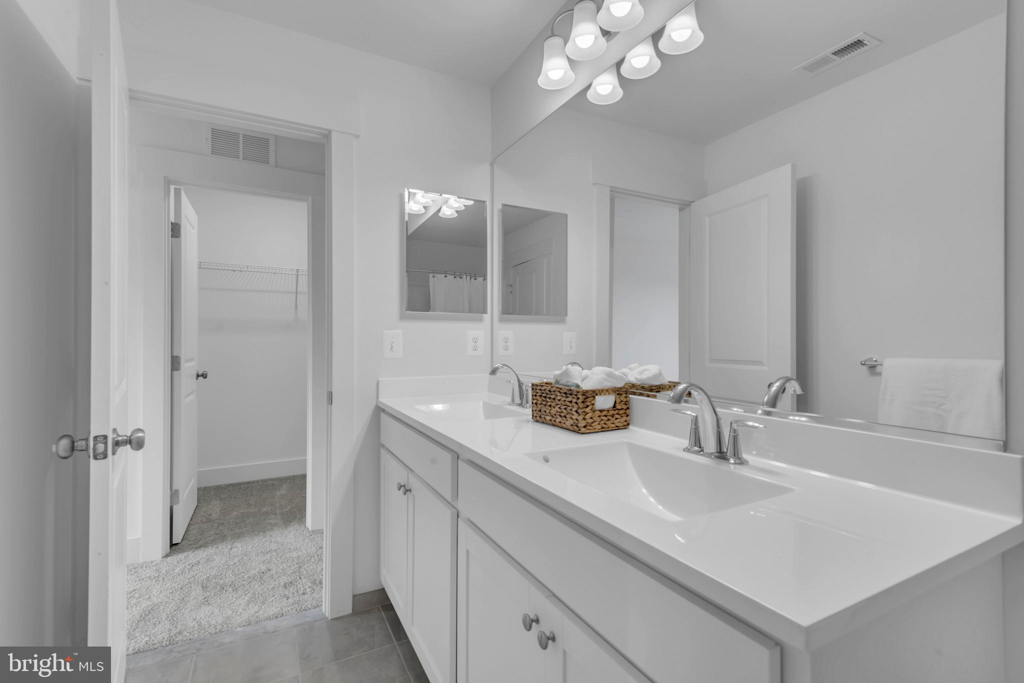 1331 German Driveway Hanover, MD 21076 - Photo 47 of 87 a bathroom with a sink double vanity and a mirror