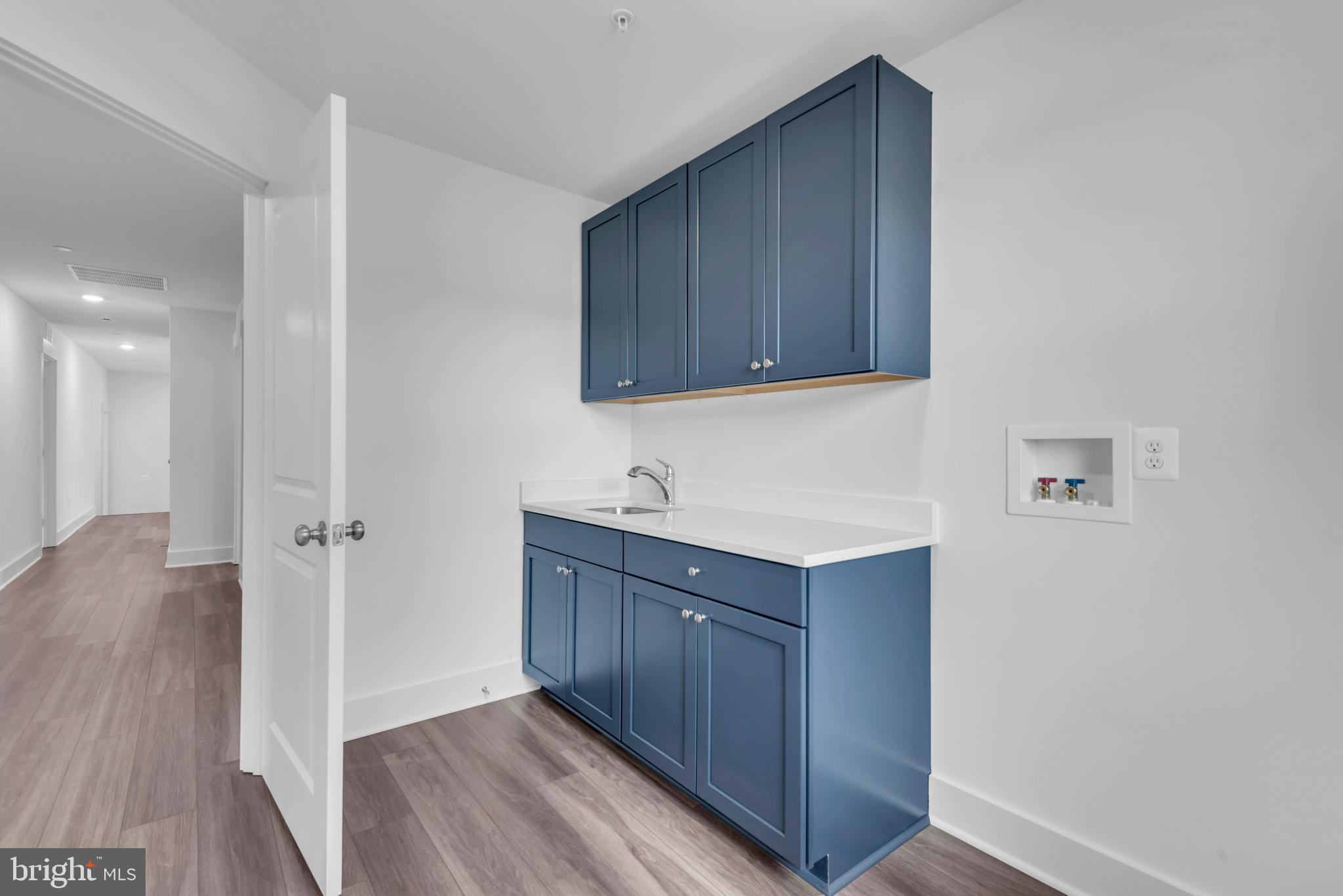 1331 German Driveway Hanover, MD 21076 - Photo 52 of 87 a view of a kitchen and a sink cabinets wooden floor
