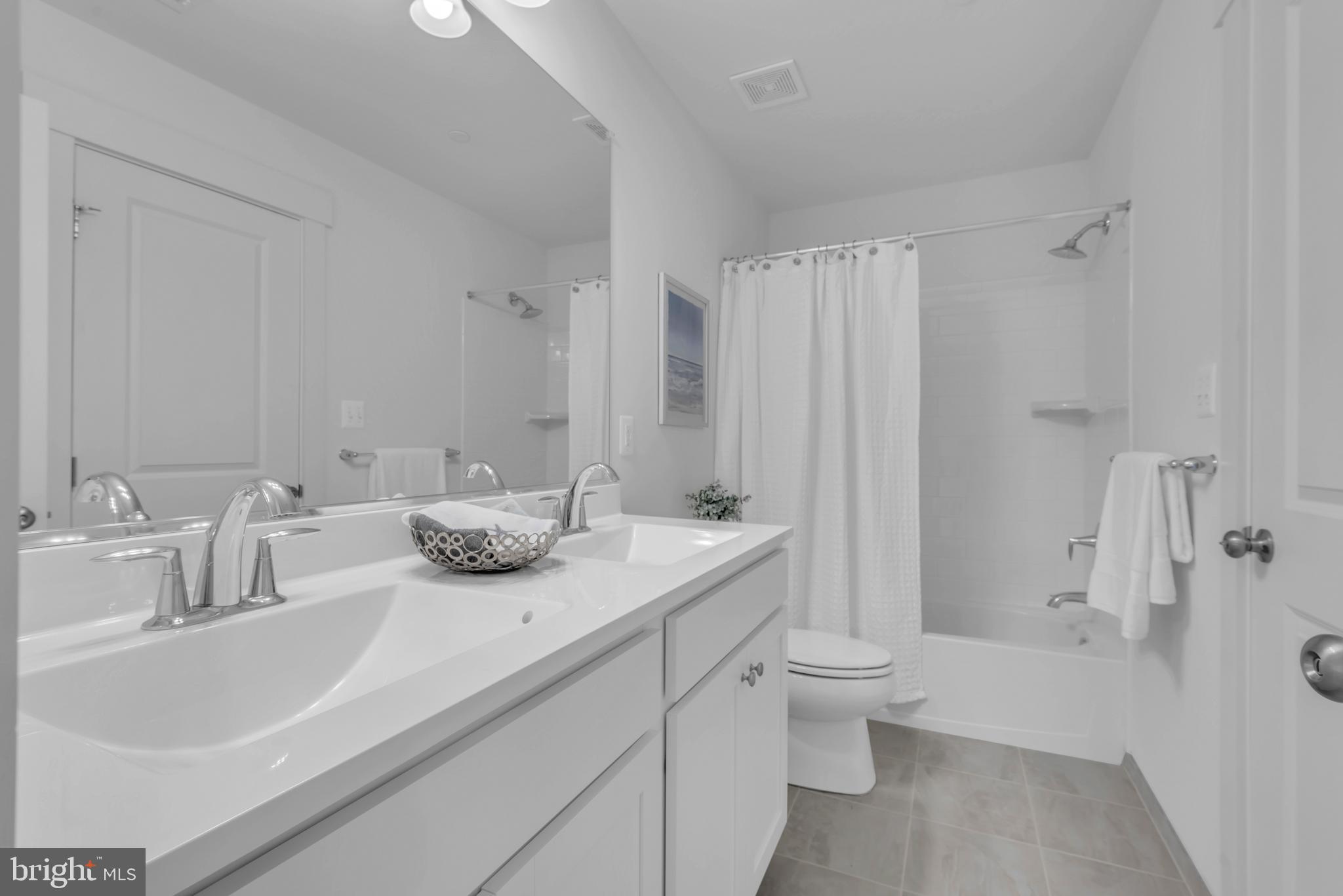 1331 German Driveway Hanover, MD 21076 - Photo 54 of 87 a bathroom with a granite countertop sink and a mirror