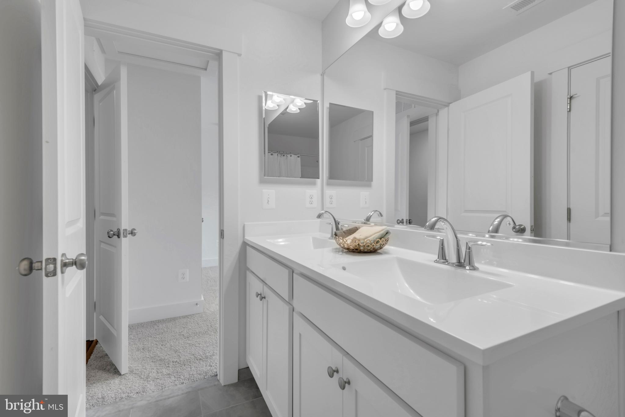 1331 German Driveway Hanover, MD 21076 - Photo 55 of 87 a bathroom with a sink and a mirror