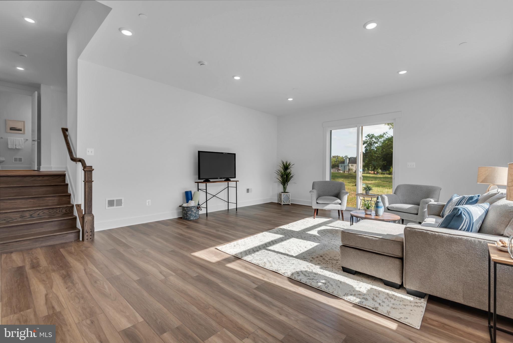 1331 German Driveway Hanover, MD 21076 - Photo 66 of 87 a living room with furniture and a flat screen tv