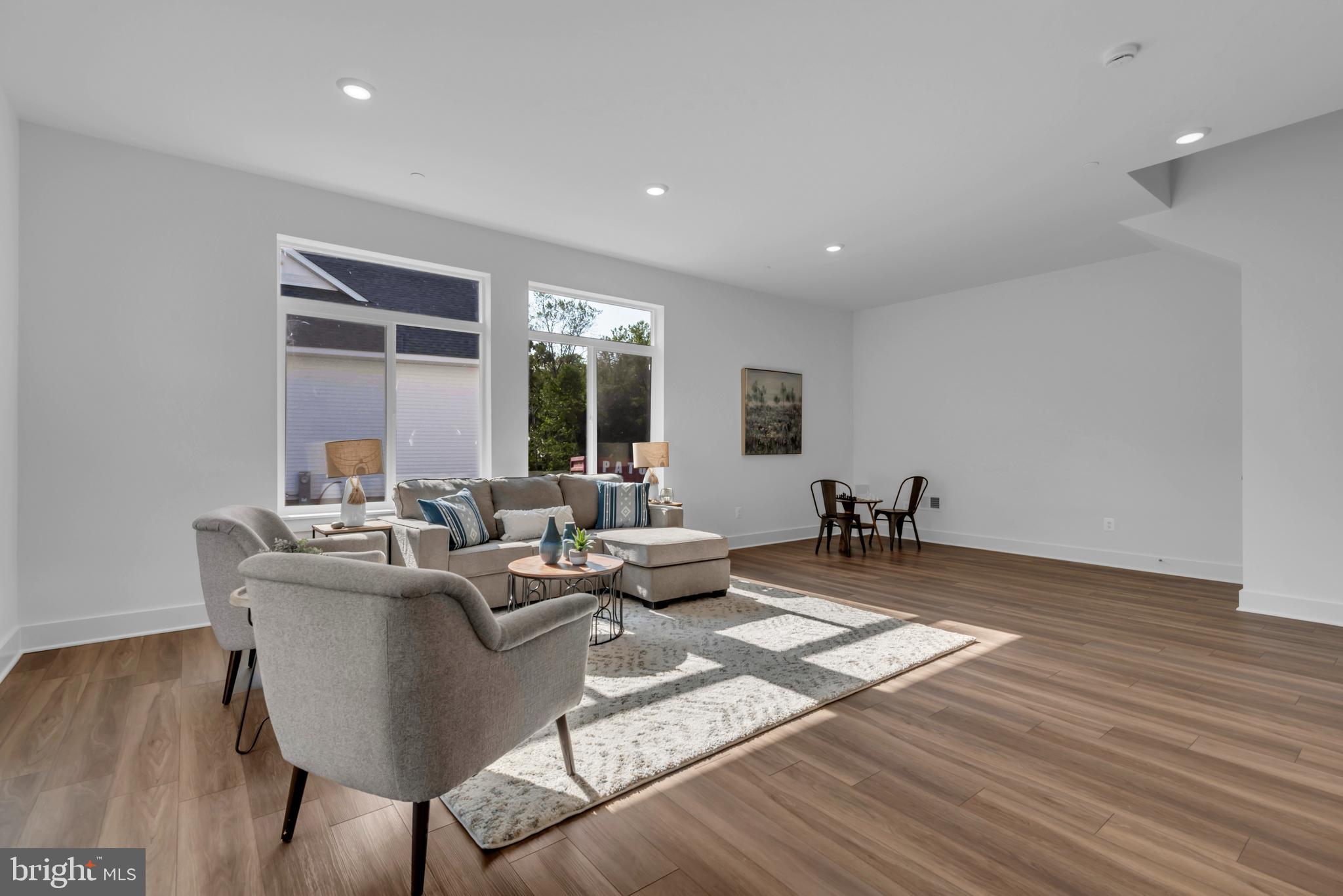 1331 German Driveway Hanover, MD 21076 - Photo 67 of 87 a living room with fireplace furniture and a wooden floor