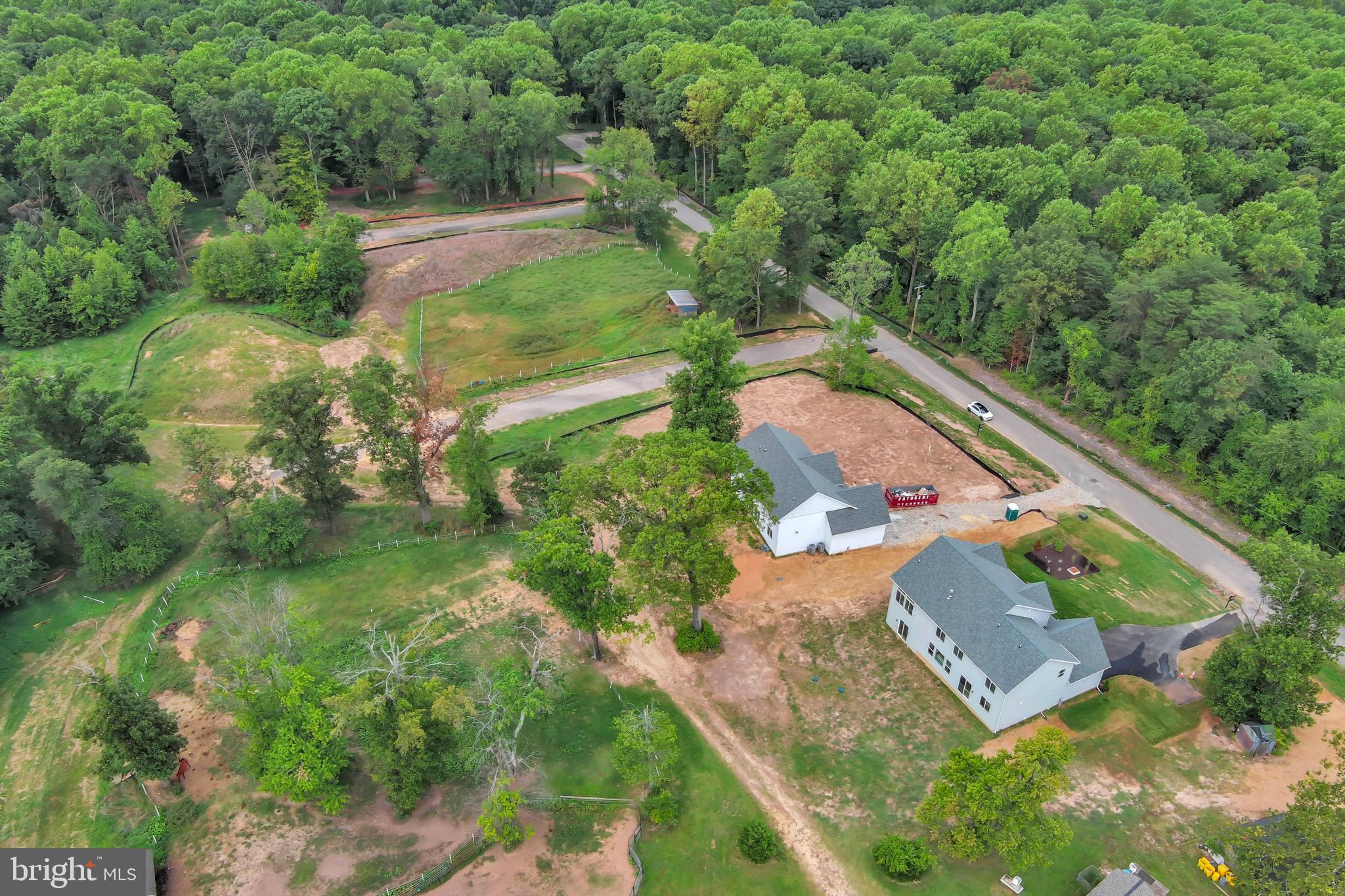 1331 German Driveway Hanover, MD 21076 - Photo 76 of 87 an aerial view of residential houses with outdoor space and trees