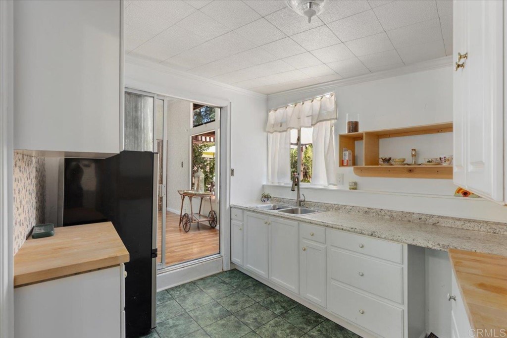365 Eldorado Drive Escondido, CA 92025 - Photo 20 of 36 a bathroom with a granite countertop sink and a mirror