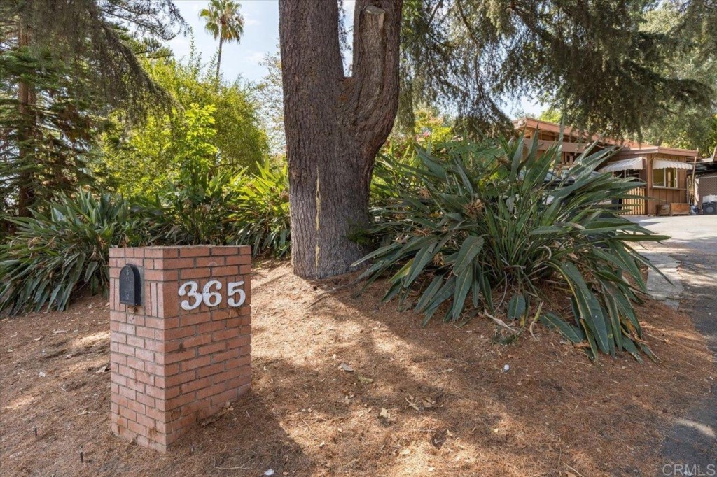 365 Eldorado Drive Escondido, CA 92025 - Photo 3 of 36 a sign that is sitting in front of a tree