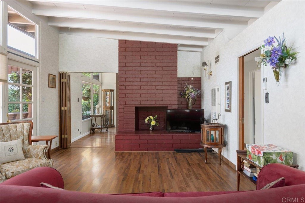 365 Eldorado Drive Escondido, CA 92025 - Photo 8 of 36 a living room with furniture and a fireplace