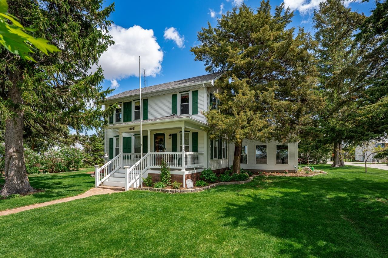 1392 Red Brick Road Dixon, IL 61021 - Photo 1 of 52 a front view of a house with garden