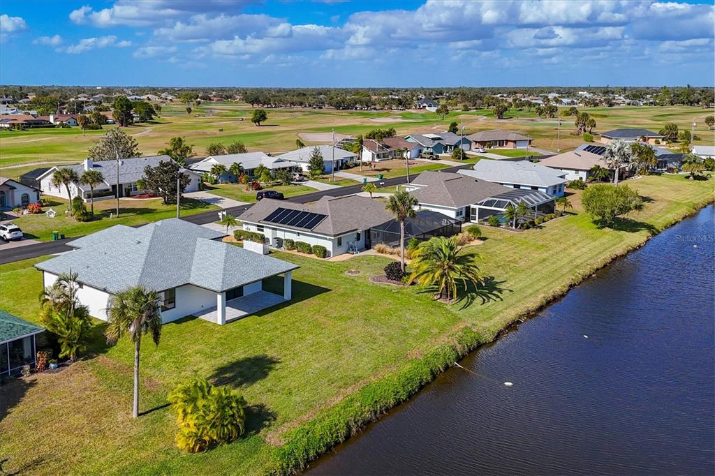 9 Bunker Place Rotonda West, FL 33947 - Photo 2 of 36 a view of a city with an ocean view