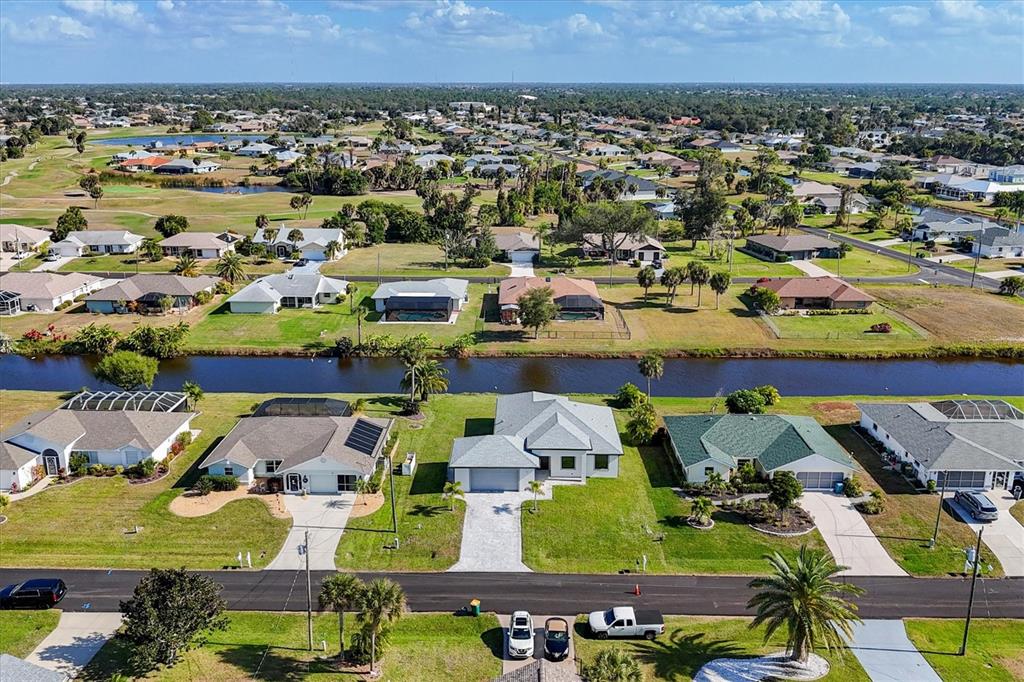 9 Bunker Place Rotonda West, FL 33947 - Photo 6 of 36 an aerial view of residential houses and outdoor space