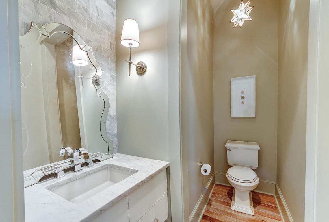 7 Winston Ln Inlet Beach Inlet Beach, FL 32461 - Photo 13 of 19 a bathroom with a toilet a sink and mirror