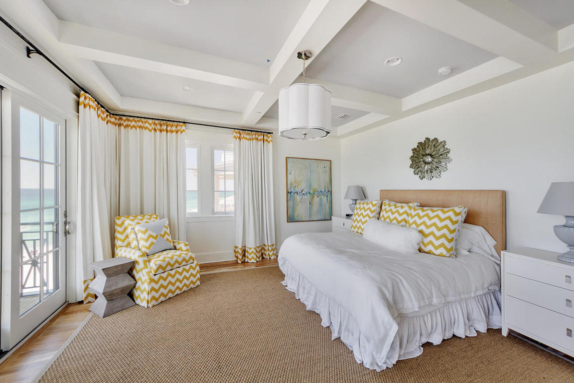 7 Winston Ln Inlet Beach Inlet Beach, FL 32461 - Photo 15 of 19 a spacious bedroom with a bed and a couch