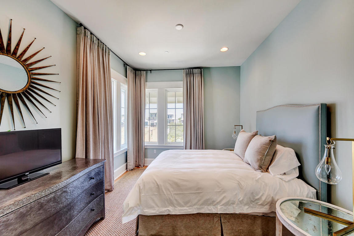 7 Winston Ln Inlet Beach Inlet Beach, FL 32461 - Photo 17 of 19 a bedroom with a bed and flat screen tv