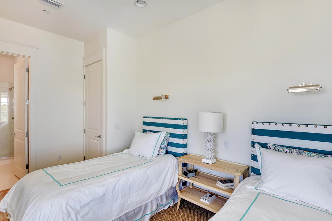 7 Winston Ln Inlet Beach Inlet Beach, FL 32461 - Photo 18 of 19 a bedroom with a bed and lamp