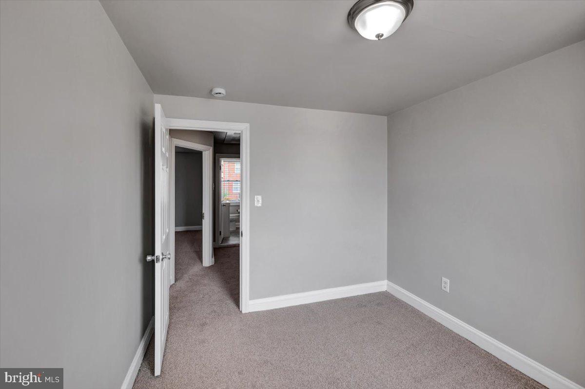 3927 Yolando Road Baltimore, MD 21218 - Photo 19 of 50 a view of a room with wooden floor