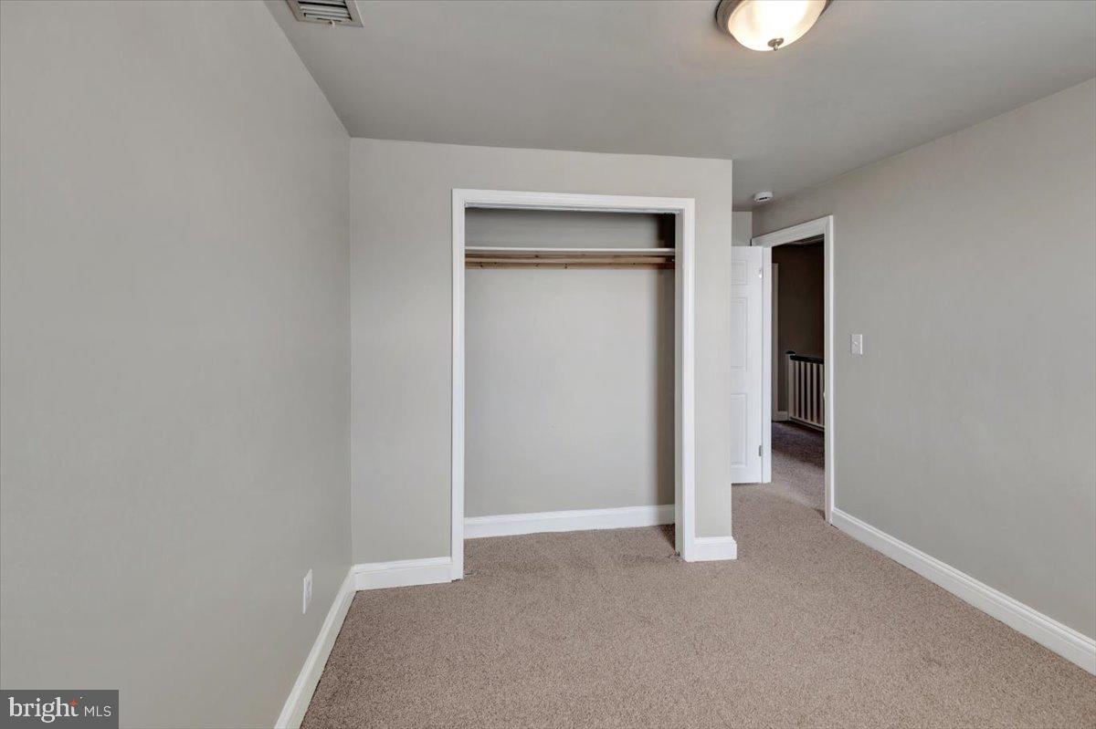 3927 Yolando Road Baltimore, MD 21218 - Photo 21 of 50 a view of an empty room with a closet