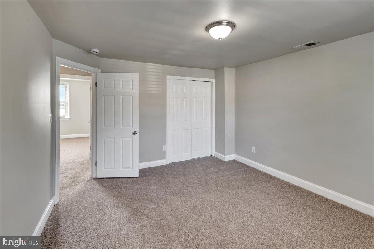 3927 Yolando Road Baltimore, MD 21218 - Photo 26 of 50 an empty room with an entryway