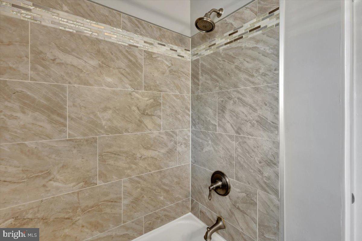 3927 Yolando Road Baltimore, MD 21218 - Photo 29 of 50 a bathroom with a shower