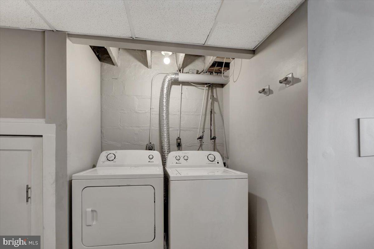 3927 Yolando Road Baltimore, MD 21218 - Photo 34 of 50 a utility room with dryer and washer