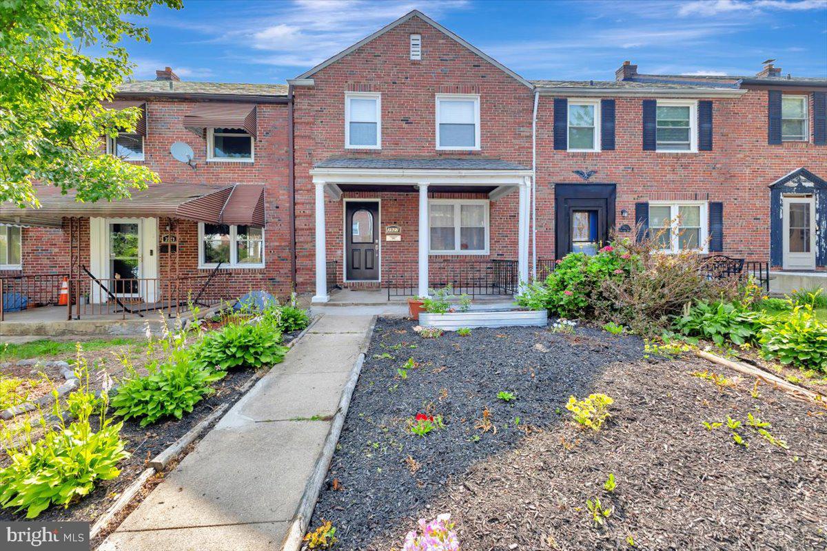 3927 Yolando Road Baltimore, MD 21218 - Photo 50 of 50 a front view of a house with a yard