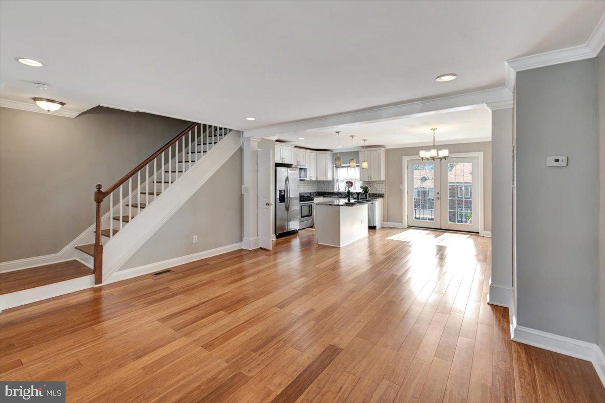 3927 Yolando Road Baltimore, MD 21218 - Photo 6 of 50 a view of a kitchen with wooden floor and a kitchen