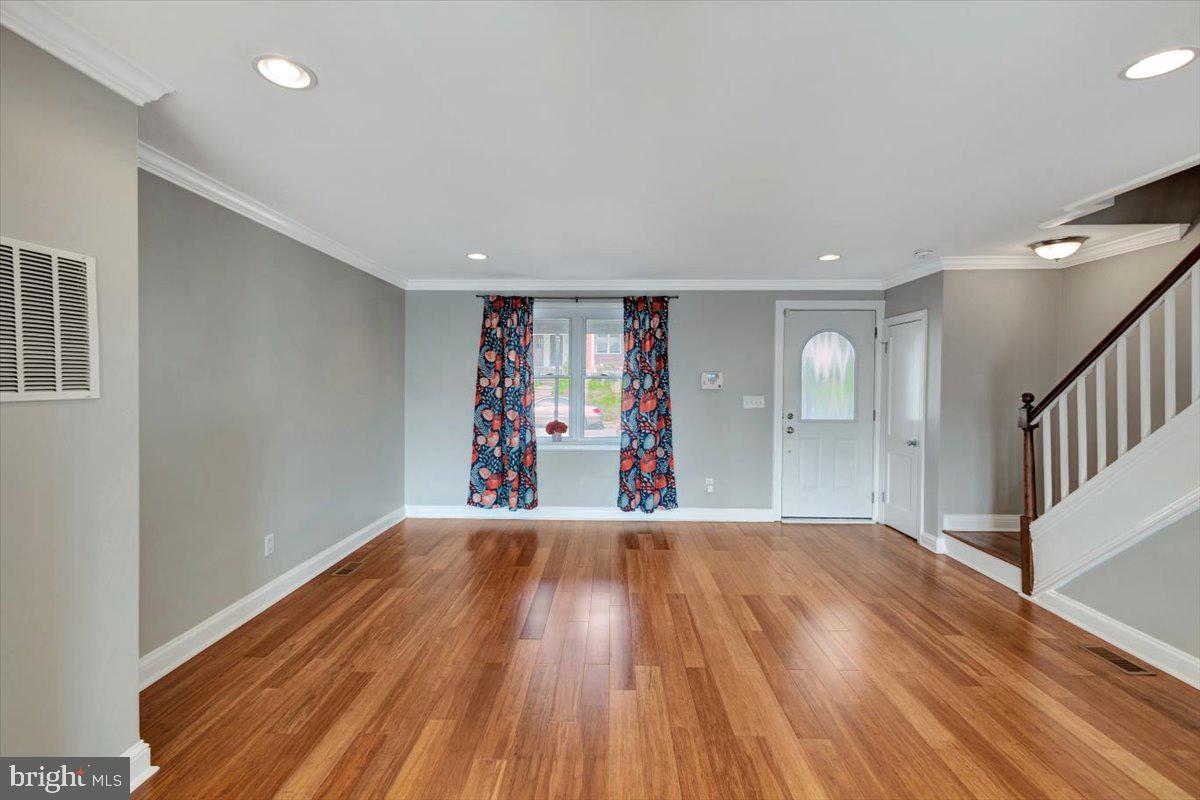 3927 Yolando Road Baltimore, MD 21218 - Photo 7 of 50 a view of a room with wooden floor and window