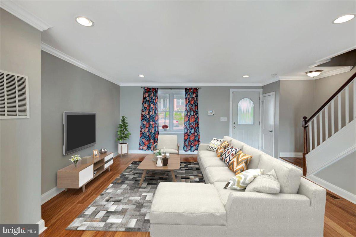 3927 Yolando Road Baltimore, MD 21218 - Photo 8 of 50 a living room with furniture and a flat screen tv