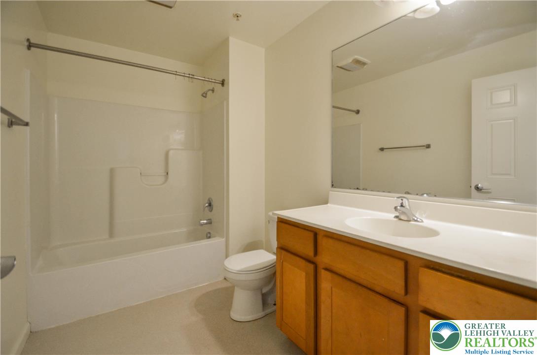70 Chesapeake Street Lancaster, PA 17602 - Photo 13 of 35 a bathroom with a sink toilet and shower