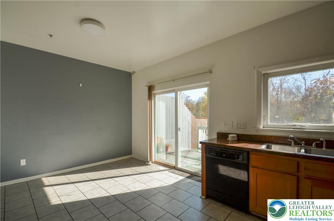 70 Chesapeake Street Lancaster, PA 17602 - Photo 9 of 35 a kitchen with a sink and a stove