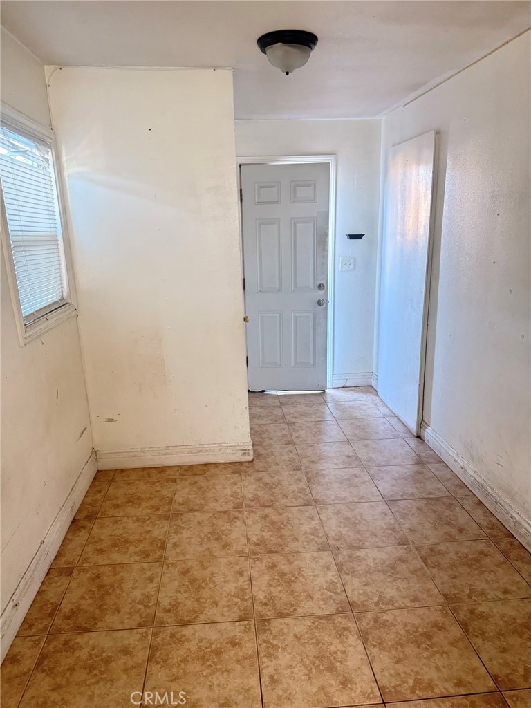 3881 Eucalyptus Avenue, Unit 3 Riverside, CA 92507 - Photo 3 of 5 an empty room with windows
