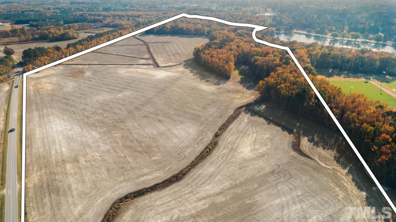 0 London Church Road Elm City, NC 27822 - Photo 9 of 28 a balcony with view of lake