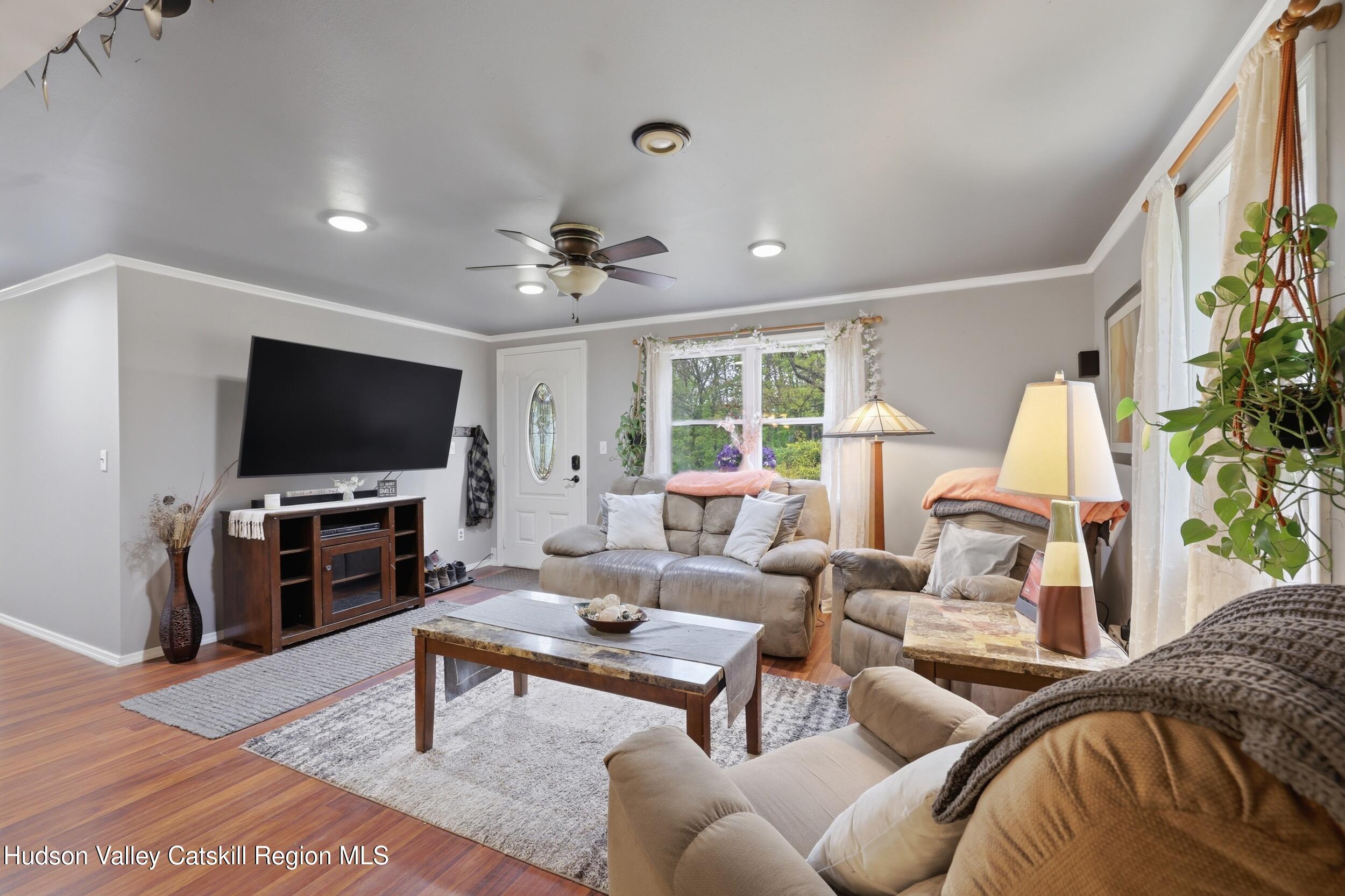 186 Cedar Hill Road High Falls, NY 12440 - Photo 8 of 33 a living room with furniture and a flat screen tv