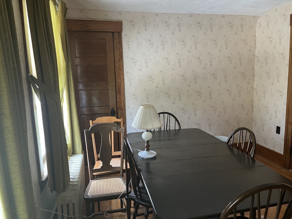 22 Commonwealth Avenue Worcester, MA 01604 - Photo 23 of 23 a view of a dining room with furniture and a window