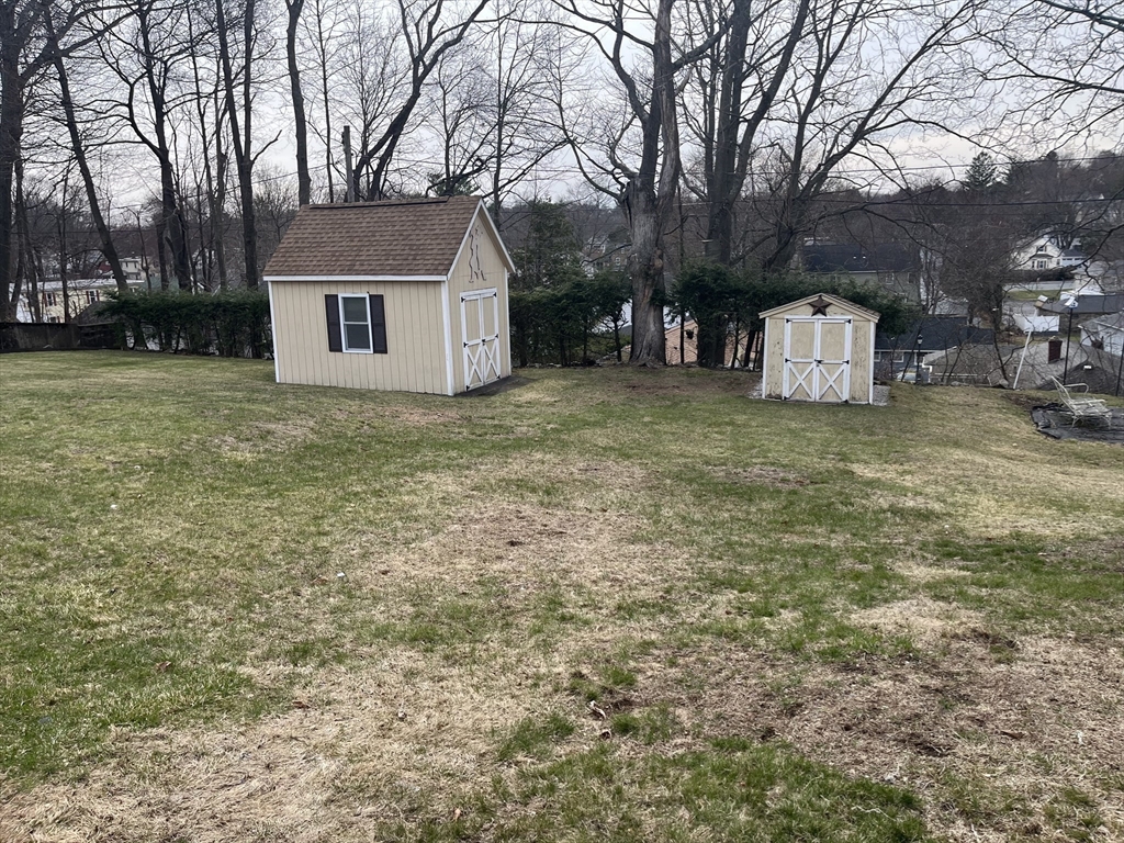22 Commonwealth Avenue Worcester, MA 01604 - Photo 5 of 23 a house with trees in front of it