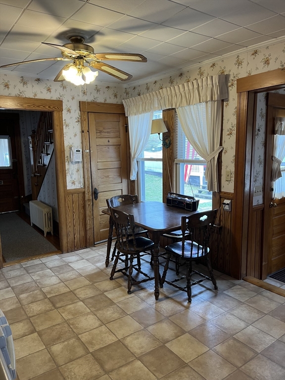 22 Commonwealth Avenue Worcester, MA 01604 - Photo 7 of 23 a view of a dining room with furniture and a chandelier