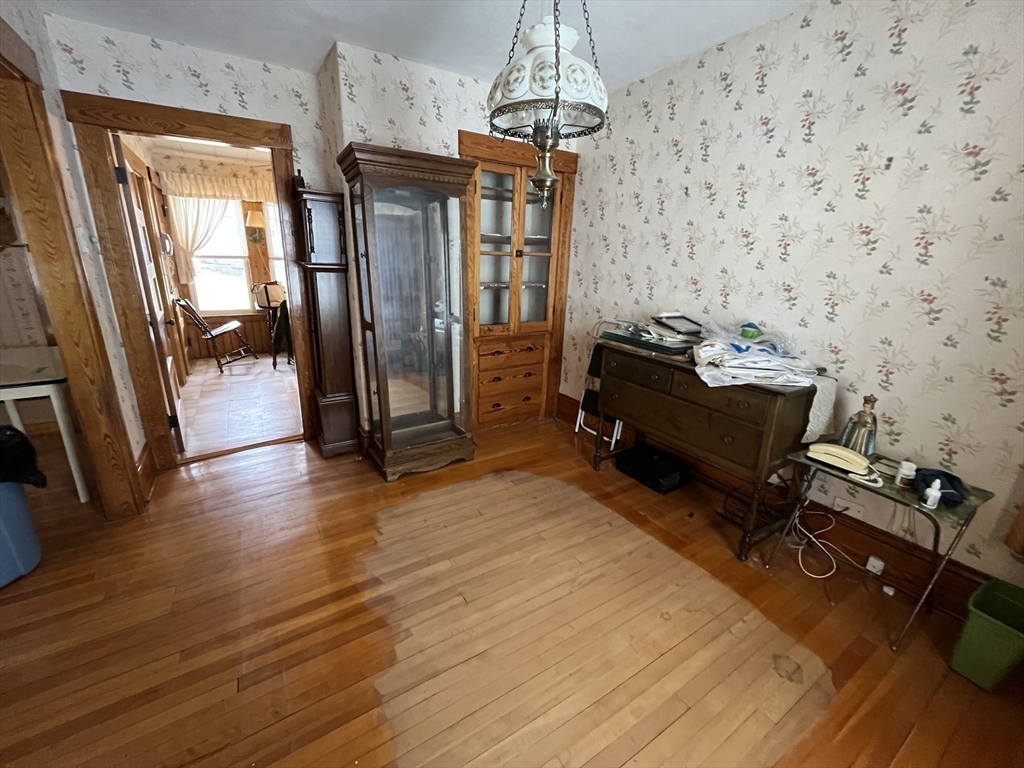 22 Commonwealth Avenue Worcester, MA 01604 - Photo 9 of 23 a bedroom with furniture window and wooden floor