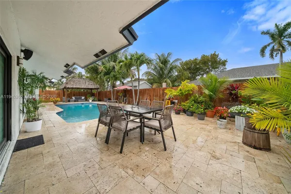 a view of a house with swimming pool