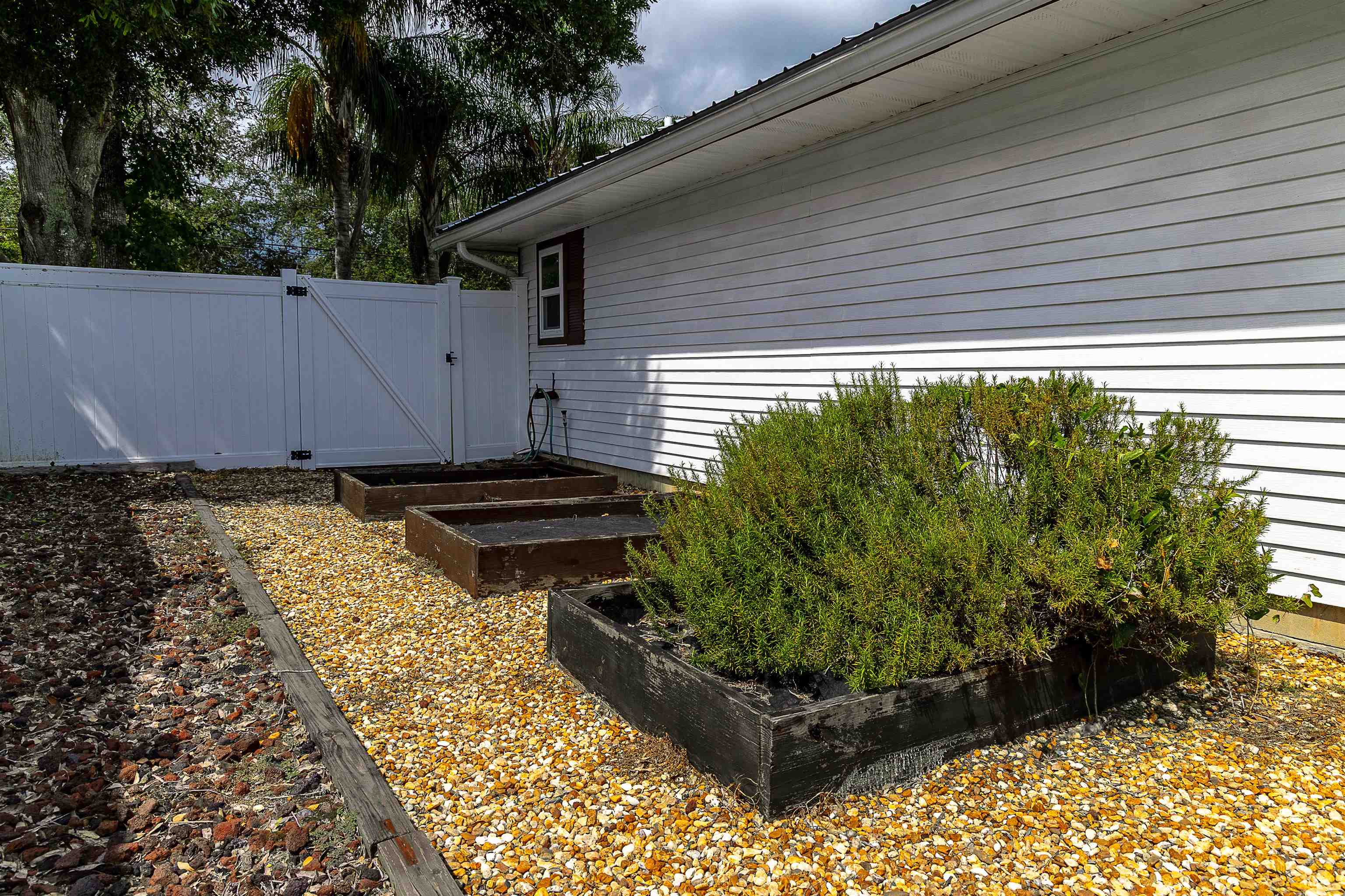 357 Orchis Road St. Augustine, FL 32086 - Photo 14 of 54 a backyard of a house with lots of green space