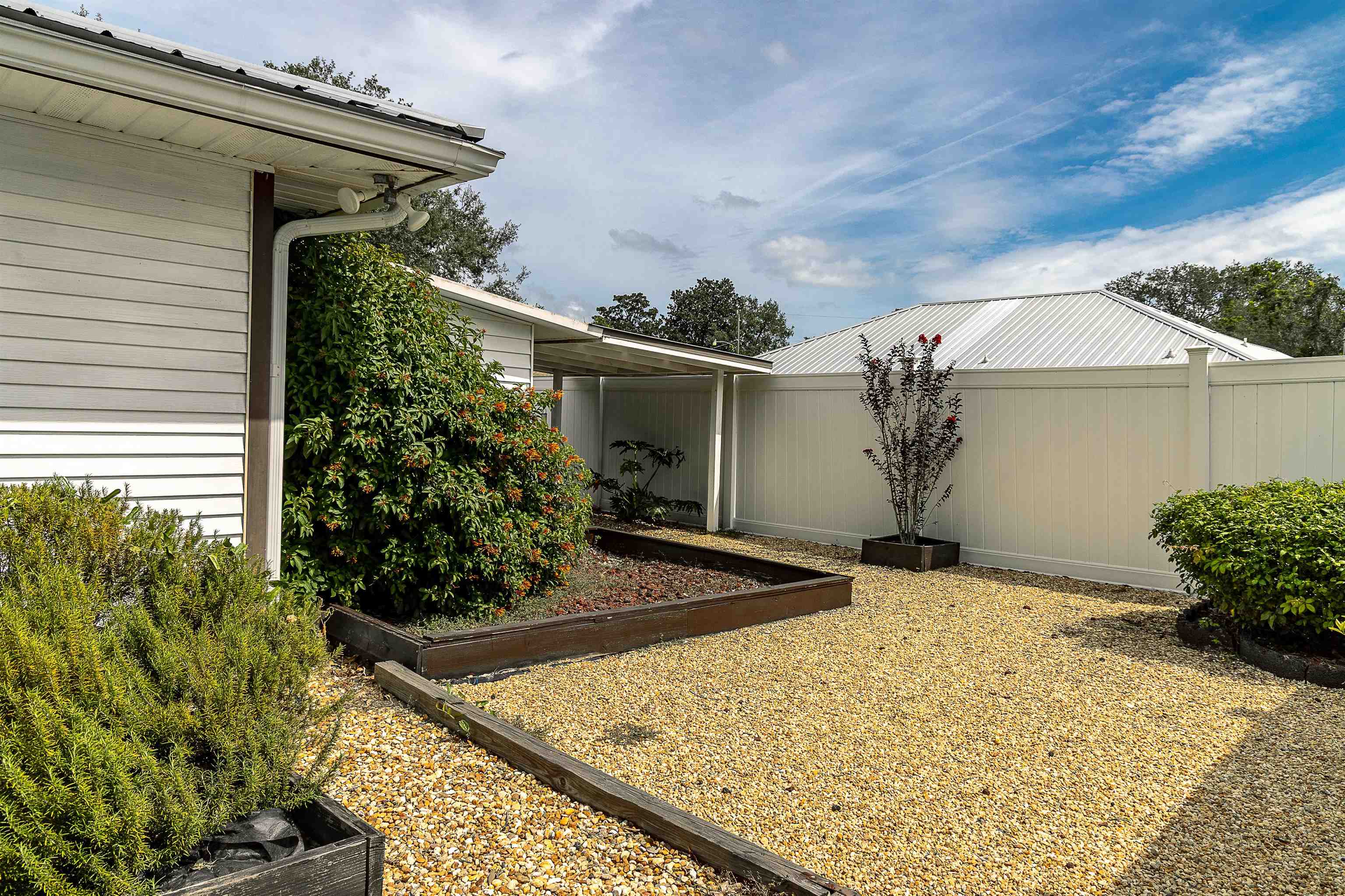 357 Orchis Road St. Augustine, FL 32086 - Photo 15 of 54 front view of a house with a yard