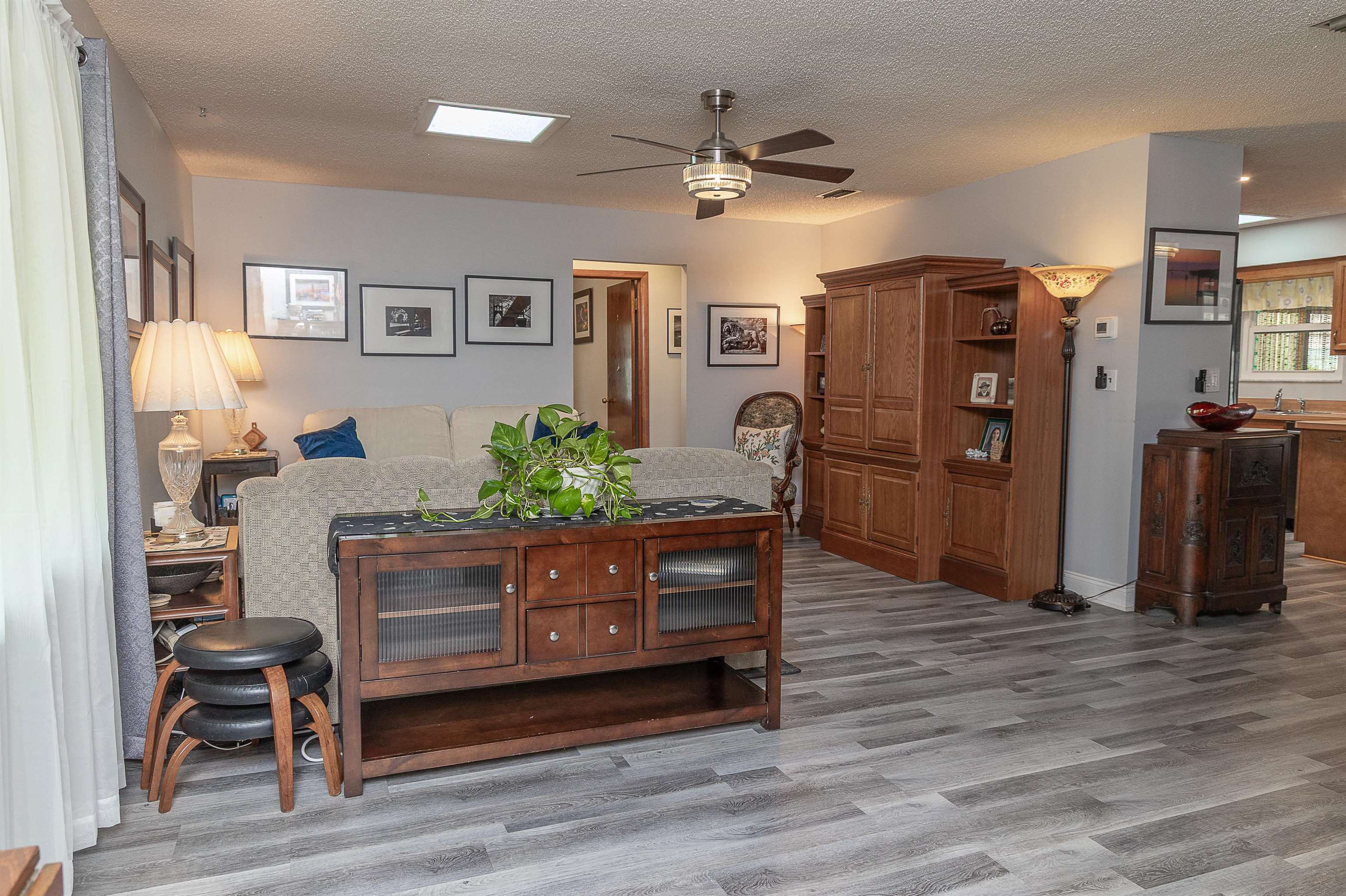 357 Orchis Road St. Augustine, FL 32086 - Photo 16 of 54 a living room with furniture and a wooden floor