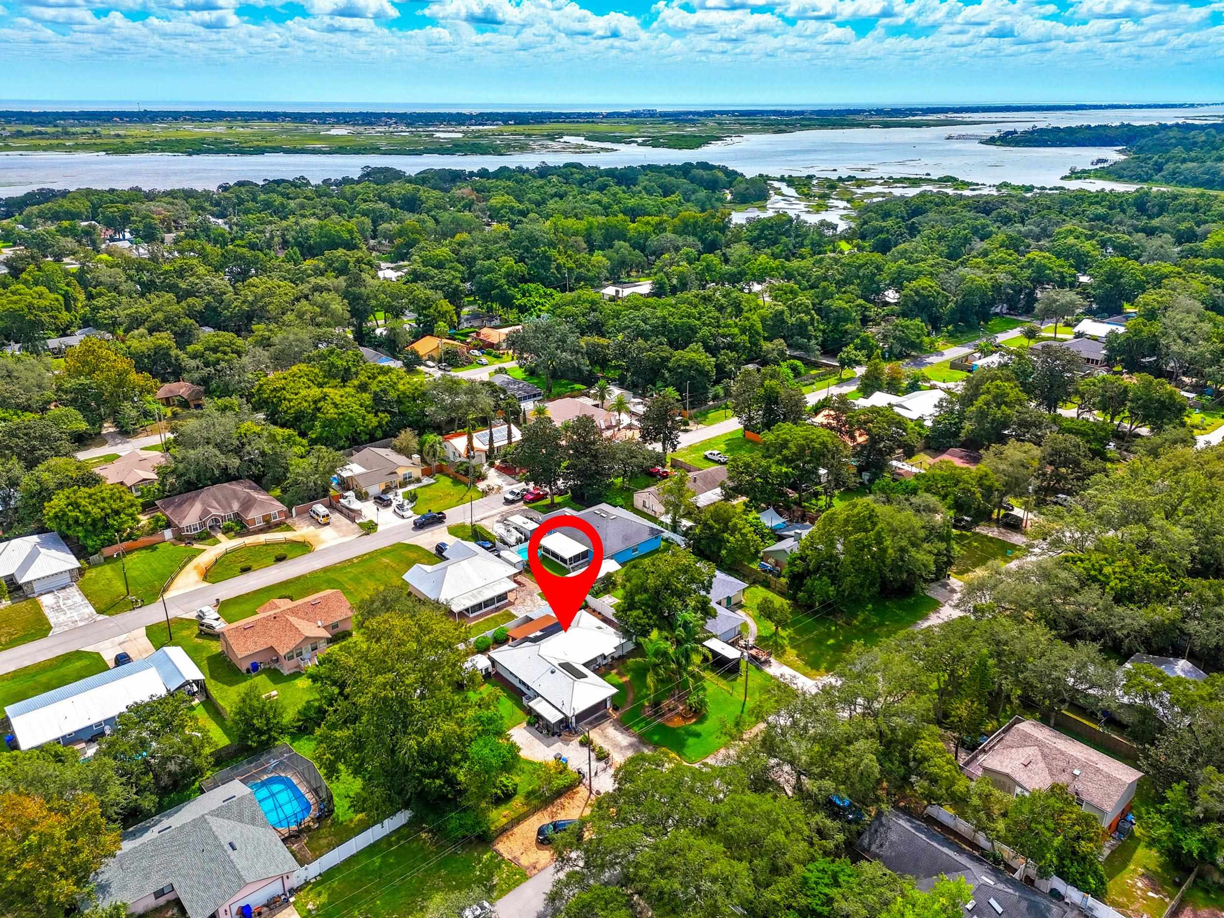 357 Orchis Road St. Augustine, FL 32086 - Photo 3 of 54 Aerial perspective of suburban area with a large body of water